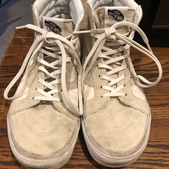 cream colored high top vans